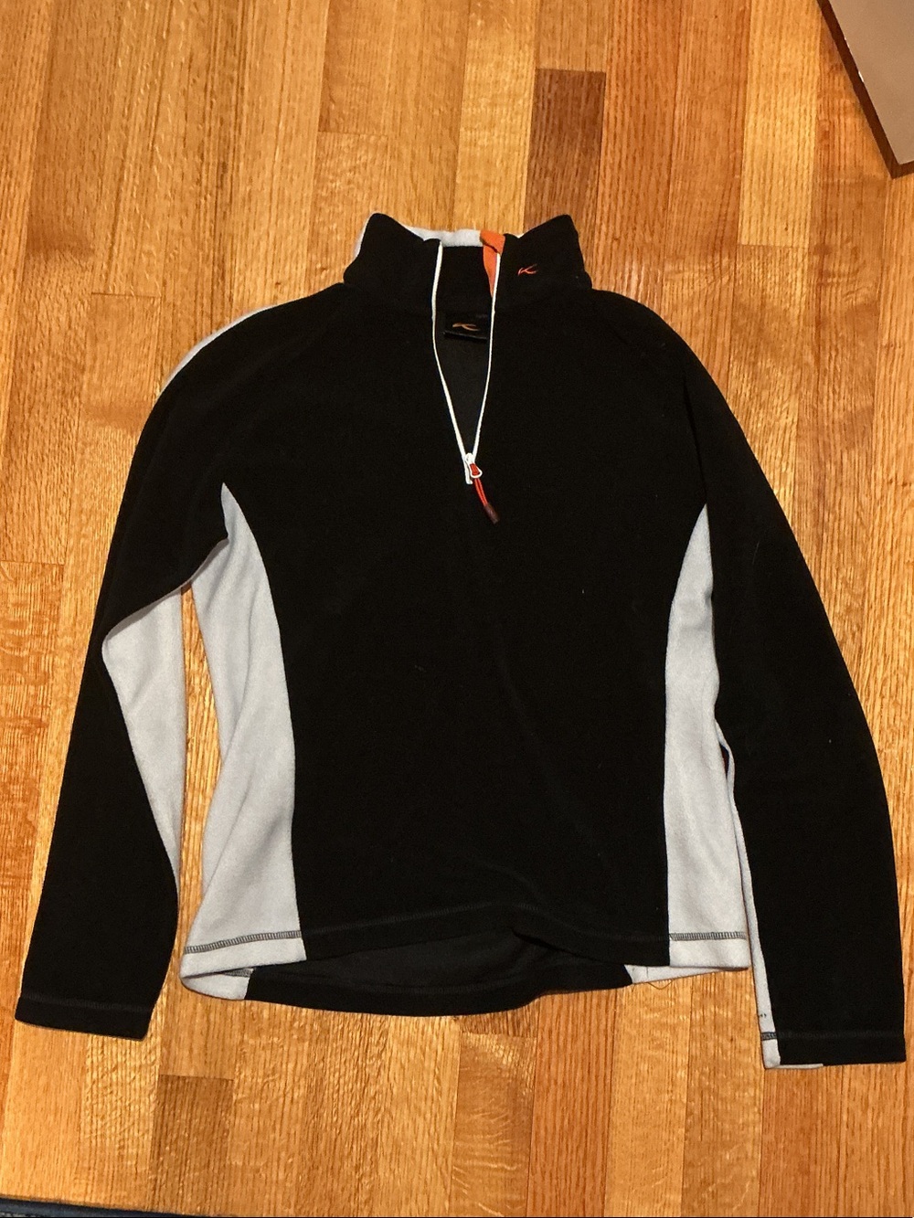 Women’s Black V-Neck Sweater with White Side Panels